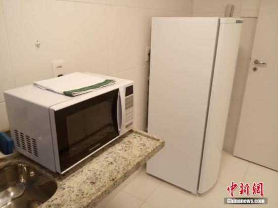 廚房里有簡單的家用電器。 <a target='_blank' href='http://www.chinanews.com/'>中新社</a>記者 盧巖 攝